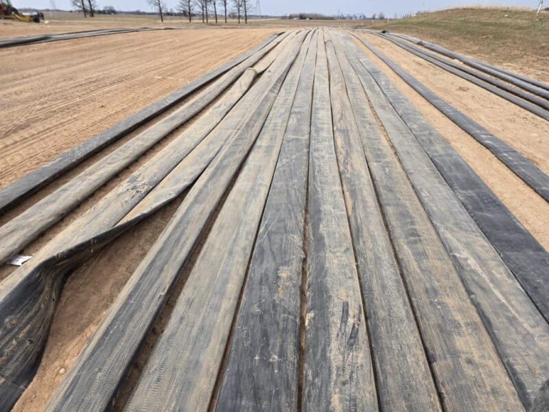 $6.5/ft -> 1.5 miles (12 Sections) of Used 10″ TPU Supply hose w. U.S.Coupling Coupler sets.
