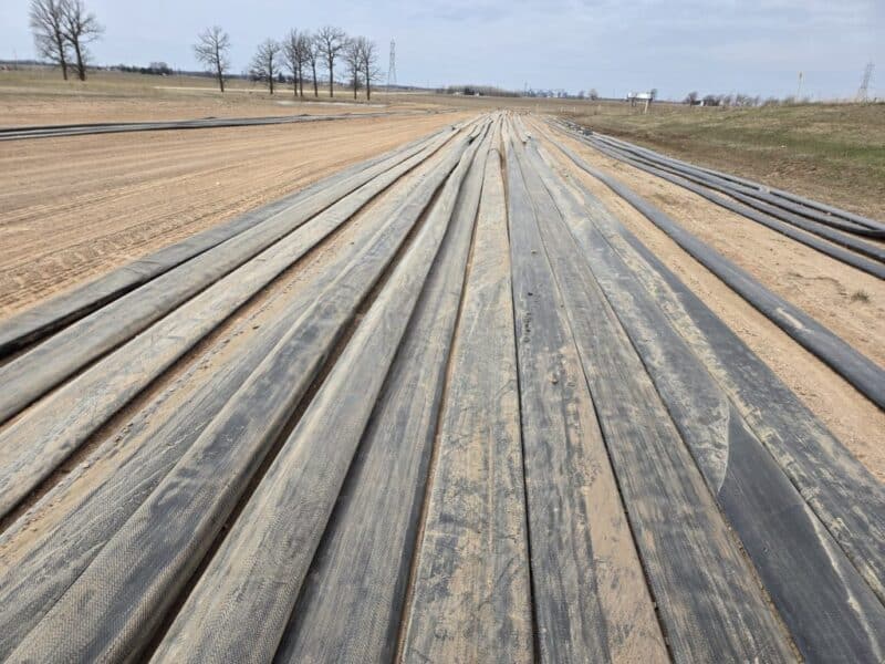 $6.5/ft -> 1.5 miles (12 Sections) of Used 10″ TPU Supply hose w. U.S.Coupling Coupler sets.