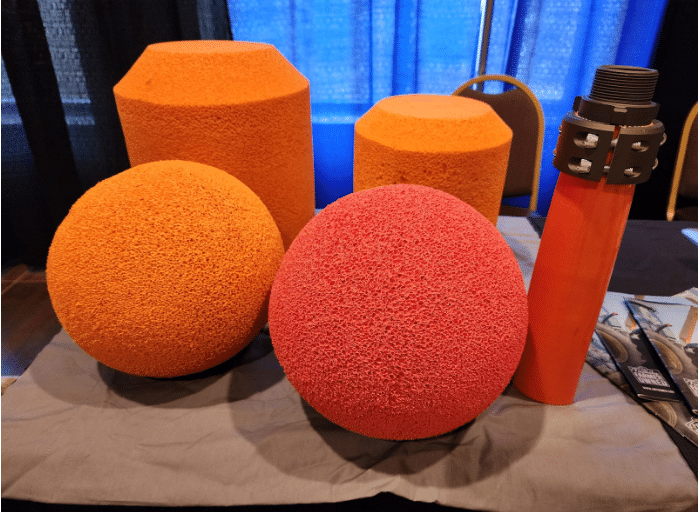 Foam cleaning balls and hose pig used to clear manure pumping hoses after each application to prevent buildup.
