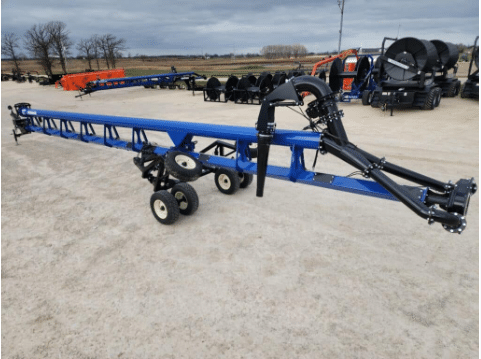 Long-reach manure application boom for uniform dragline field spreading and precision flow