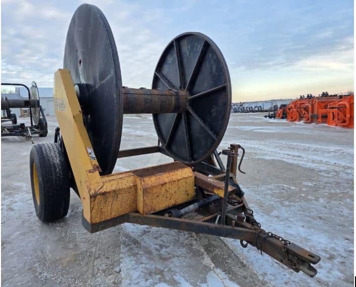 Modern dragline manure system with large hose reels designed for continuous manure flow across wide agricultural fields