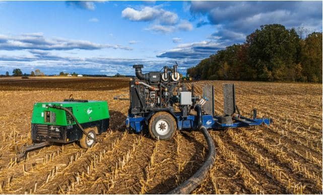 Dragline manure equipment applying slurry efficiently while reducing soil compaction across agricultural fields