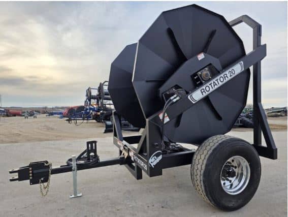 Rotator 20 manure equipment for efficient farm operation, showcasing a black drum on wheels.